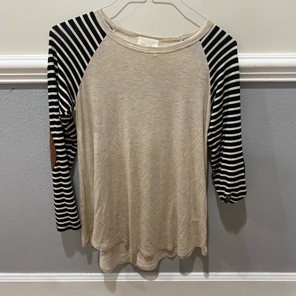 Beige and black and white striped top